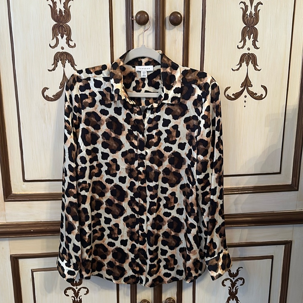 Cheetah print blouse. Size 6.
